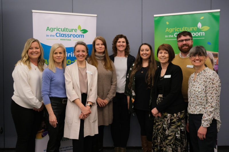 Employees smiling together at event