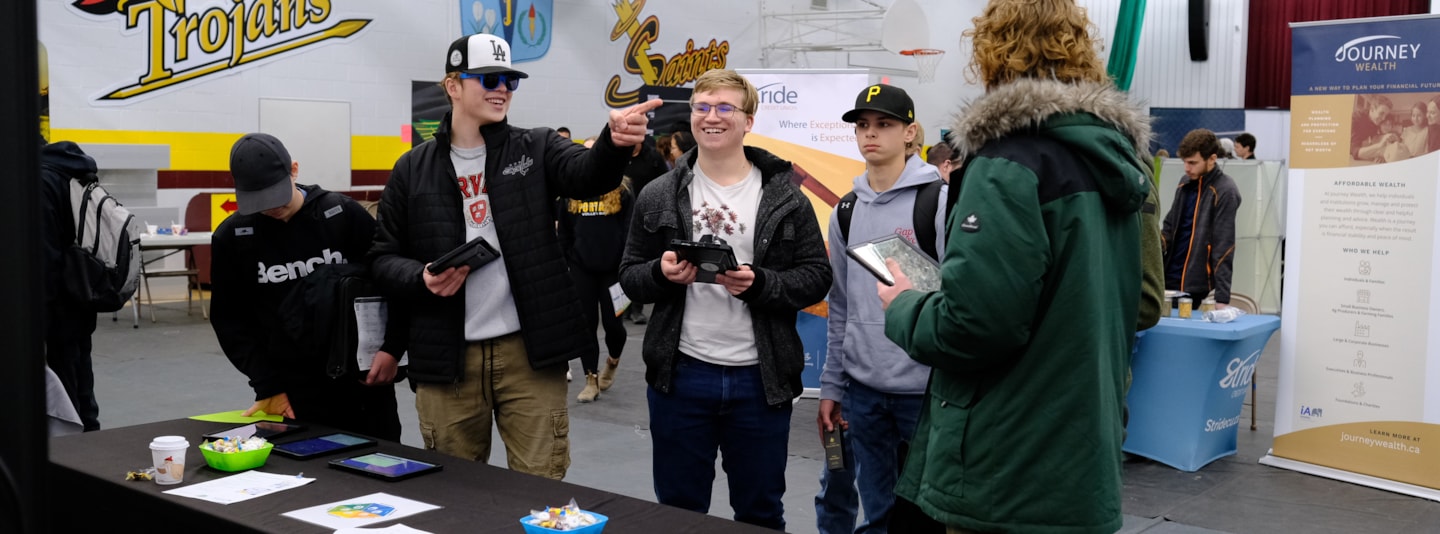 High school students participating in career fair activity