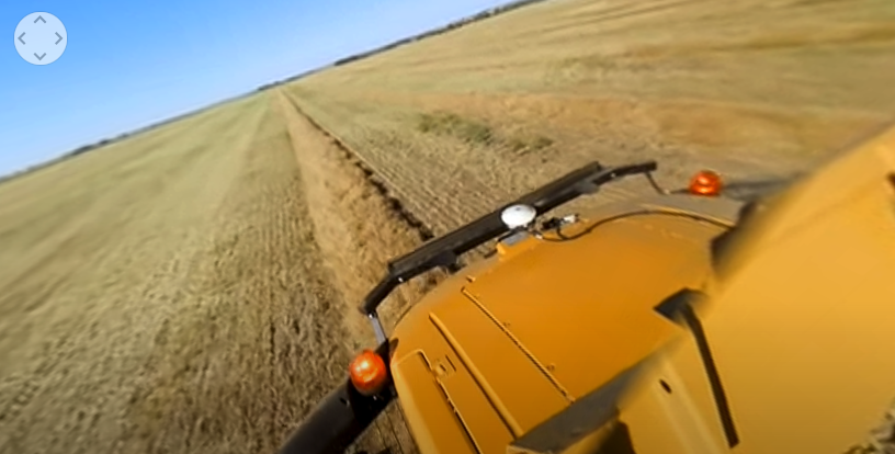 Tractor driving on farm