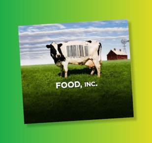 Food Inc text on image of beef cow with barcode in farm field with red barn in the background 