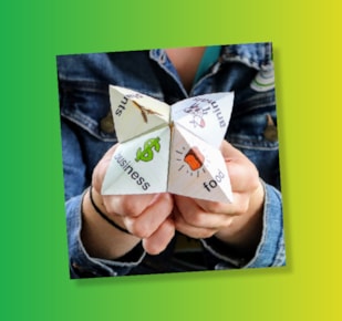 Student in jean jacket holding agriculture fortune teller on green and yellow gradient background